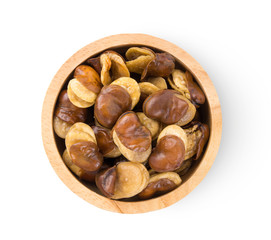 Broad windsor fava bean seeds in wood bowl isolated on white background. top view