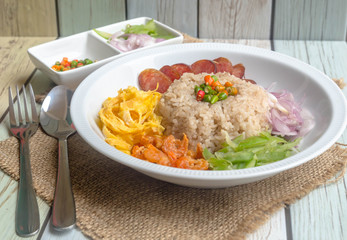 Fried rice with shrimp paste and Side dish on wood background,Thai traditional cuisine.