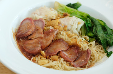 yellow nooddle with honey pork roasted and dumpling