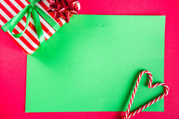 Christmas gift boxes simple pattern background. Festive boxes with Christmas presents, decorated...