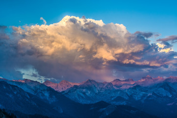 Fototapeta na wymiar Dramatic Clouds Gather over the Great Western Divide at Sunset - 1