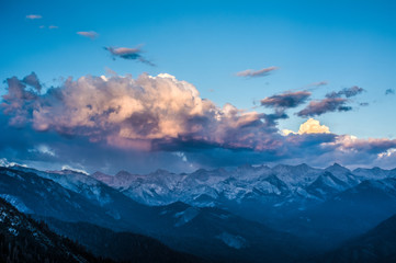 Fototapeta na wymiar Dramatic Clouds Gather over the Great Western Divide at Sunset - 2
