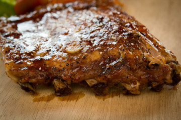 Close up BBQ pock on wooden 