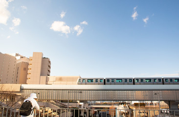 Odaiba, Japan - 13 DEC 2017: Asian tourist with his camera trying to snap the local Japanese...