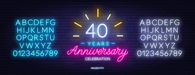 40th anniversary celebration neon sign on dark background. Neon alphabet . Template for invitation or greeting card.