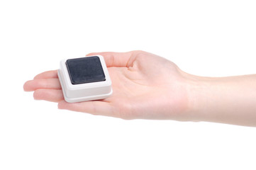 door button in hand on a white background isolation