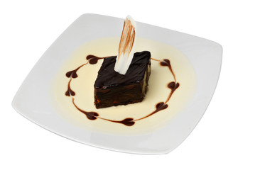 Piece of delicious cake on a white isolated background