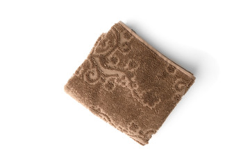 Brown towel isolated on white background.
