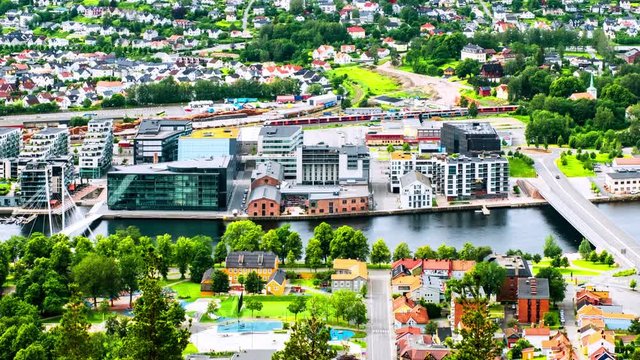 Drammen, Norway. Aerial view of the city center of Drammen, Norway during a sunny summer day. Time-lapse of car traffic and river, panning video