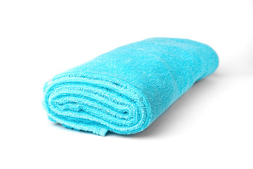 Blue towel isolated on white background.