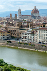 Fototapeta premium Florence cityscape with Arno river in a summer day.