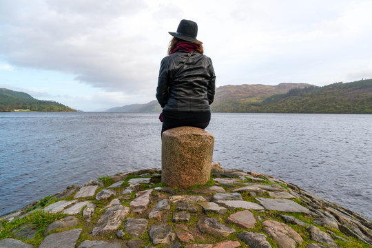 Woman view Loch Laggan in Scotland