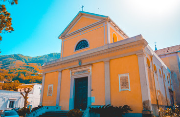 beautiful church at ischa, italy with mountains in the backgroundbeautiful church at ischa, italy with mountains in the background