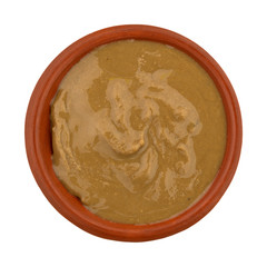 Organic sunflower seed butter in a bowl on a white background