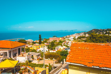 some mediterranean houses with ocean in the backgroundsome mediterranean houses with ocean in the background