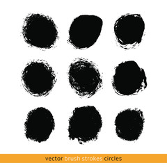 black vector brush strokes circles of paint on white background 