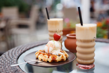  Tasty breakfast, beautiful server, coffee, toast and ice cream