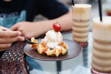  Tasty breakfast, beautiful server, coffee, toast and ice cream