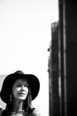 Black haired lady with black hat