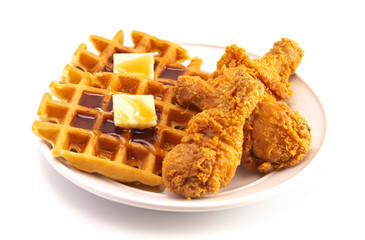 Pile of Chicken and Waffles Isolated on a White Background