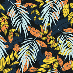 Abstract trend seamless pattern with colorful tropical leaves and plants on black background. Vector design. Jungle print. Floral background. Printing and textiles. Exotic tropics. Summer.