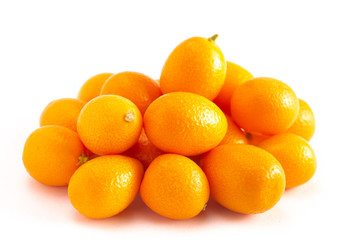 Pile of Kumquats Isolated on a White Background