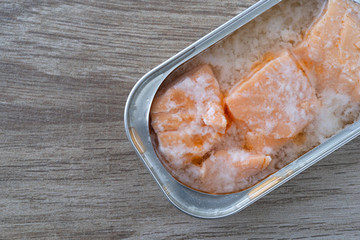 Salmon in a tin on a countertop