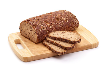 Rye bread with sunflower seeds on a cutting board, isolated on white background
