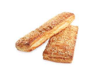 Fresh tasty puff pastry on white background