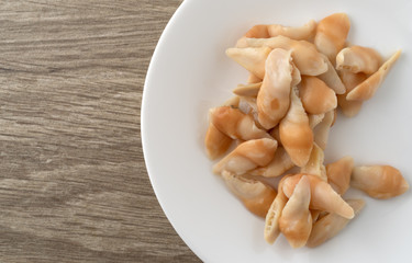 Serving razor clams on a table top view