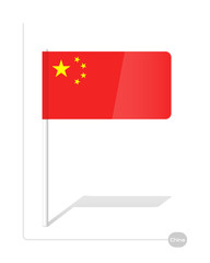 The Chinese plastic flag it is fastened on a white plastic stick the flag is isolated on a white background.