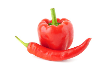 Red paprika and sweet pepper isolated on white background