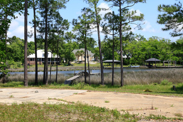 Fototapeta na wymiar Apartment houses at a canal in Pass Christian, Mississippi, USA