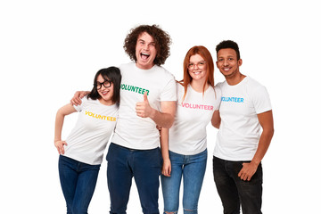 Happy multiracial volunteers smiling for camera