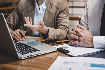 Business team colleague working with new startup project plan and discussion information for financial strategy with laptop, results of their successful teamwork