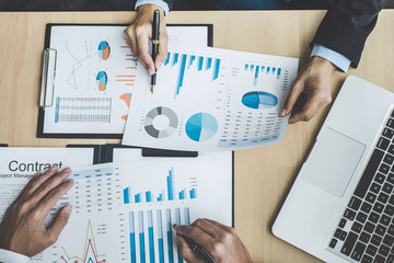 Two executive discussing company growth project success financial statistics, Partner meeting professional investor working start up project for both company with document, laptop and digital tablet