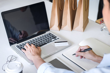 Woman using credit card register security code and payments online shopping and customer service network connection market, using on laptop, Internet Online shopping or internet banking concept