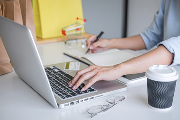 Woman using credit card register security code and payments online shopping and customer service network connection market, using on laptop, Internet Online shopping or internet banking concept