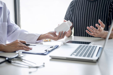 Doctor presenting report of diagnosis, symptom of disease and recommend something a method with patient treatment, after results about the problem illness of patient