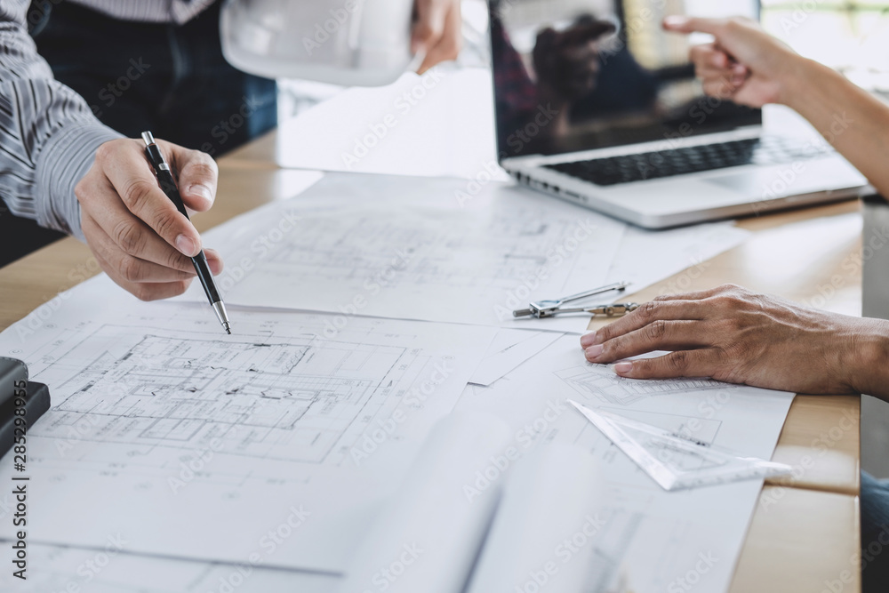 Wall mural construction and structure concept of engineer or architect meeting for project working with partner