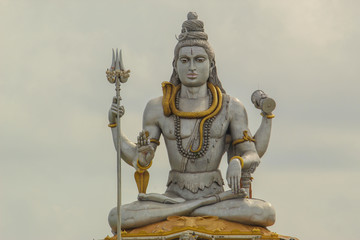 Fototapeta premium Murdeshwar is a town in Bhatkal Taluk of Uttara Kannada district in the state of Karnataka, India. The town is located 13 kms from the taluk headquarters of Bhatkal. Murdeshwar is famous for the world