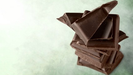 Delicious chocolates isolated on  background