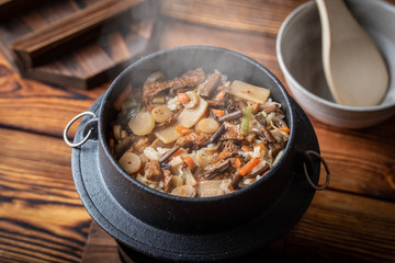 Kamameshi, japanese pot rice with autumn ingredients