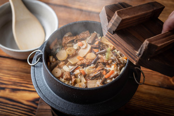 Kamameshi, japanese pot rice with autumn ingredients