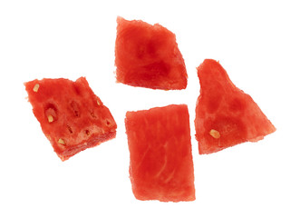 Four watermelon chunks on a white background top view