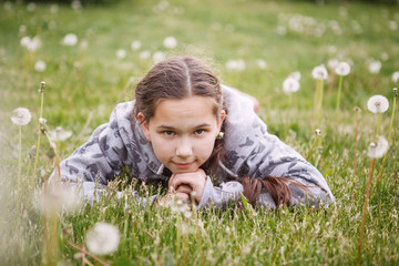 Girl teenager with pigtails.