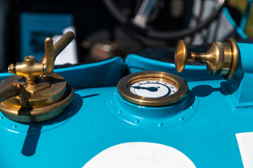 Blue Vintage old car exterior detail - fuel tank indicators