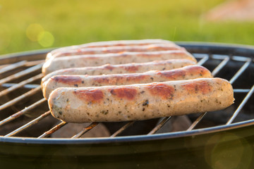 Sausages are grilled at the barbecue party