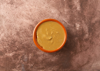Organic cashew nut butter in a bowl on a table