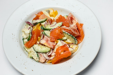 vegetable salad with salmon and avocado